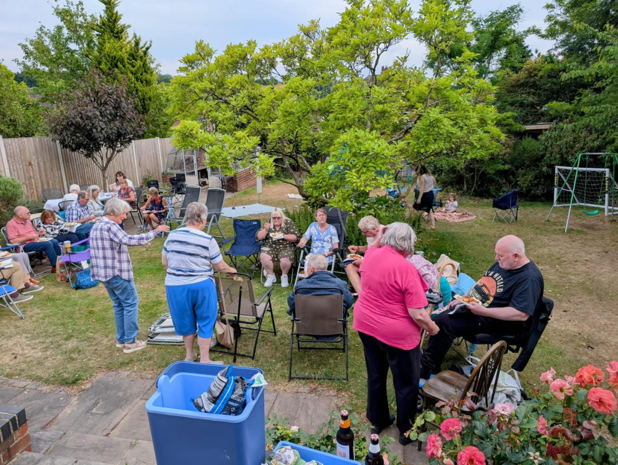 A happy group tucking into their buffet meal