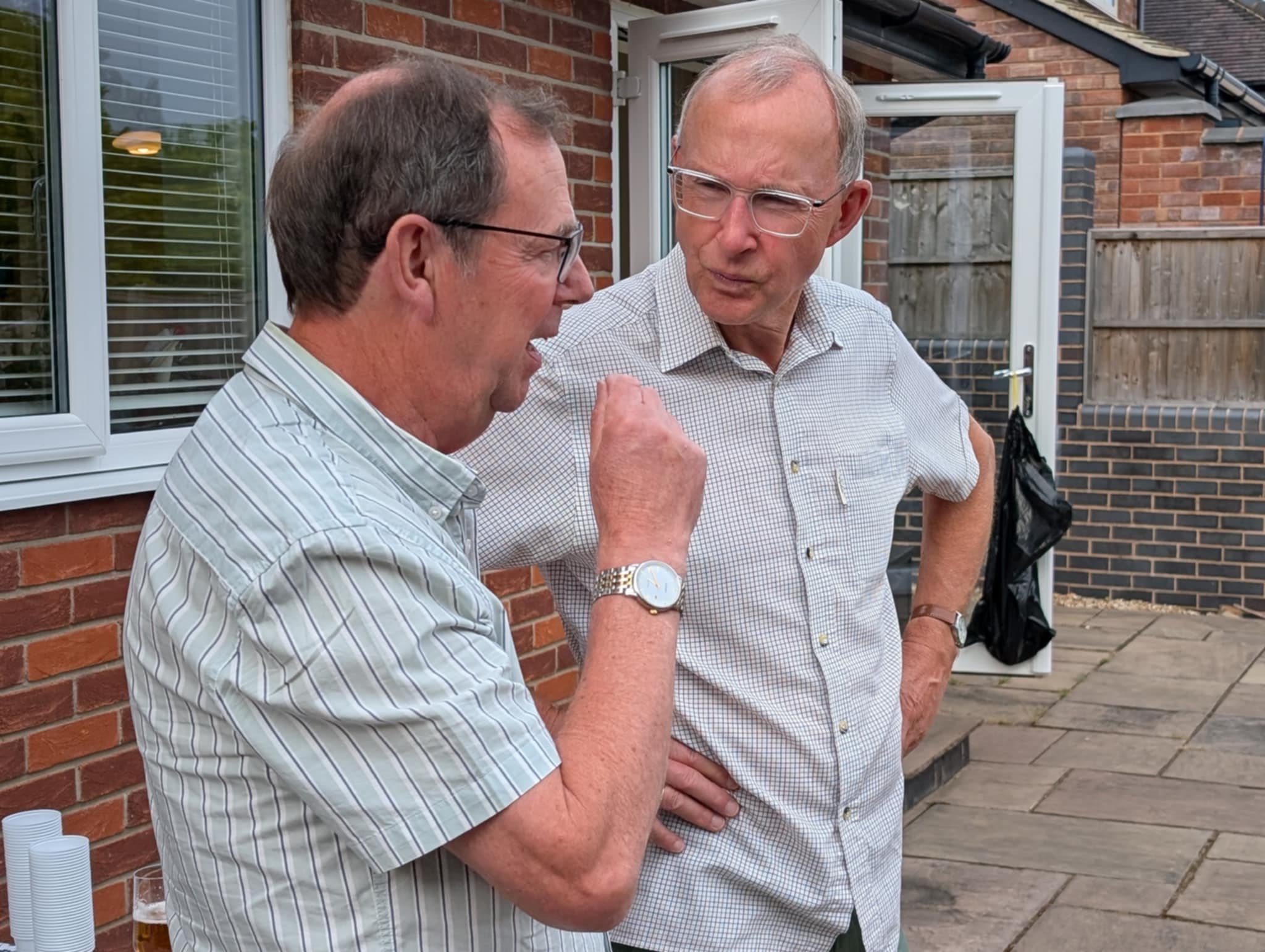Paul Taylor (L) Treasurer in conversation with Martin Wilding (R) Social Organiser.